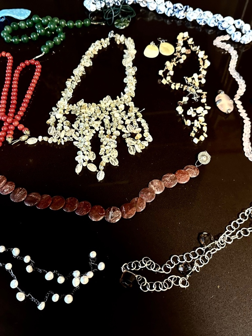 A bundle of necklaces - semi-precious stones, coral, mother-of-pearl, glass, c
